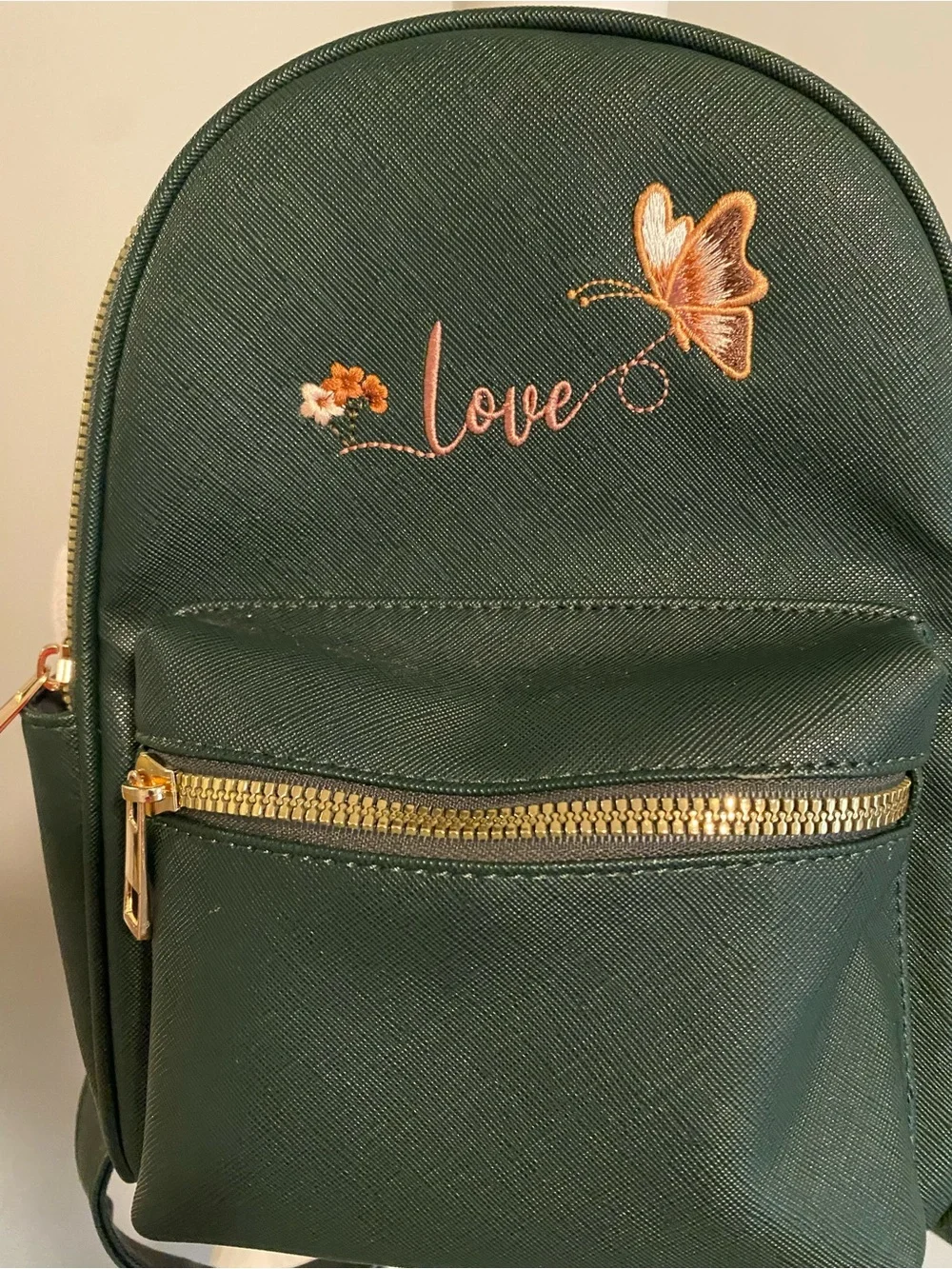 'Love' Embroidered Mini Backpack with Pom Accent in Dark Green